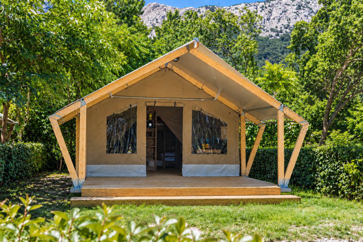 Cascade Series architectural glamping tent among green trees